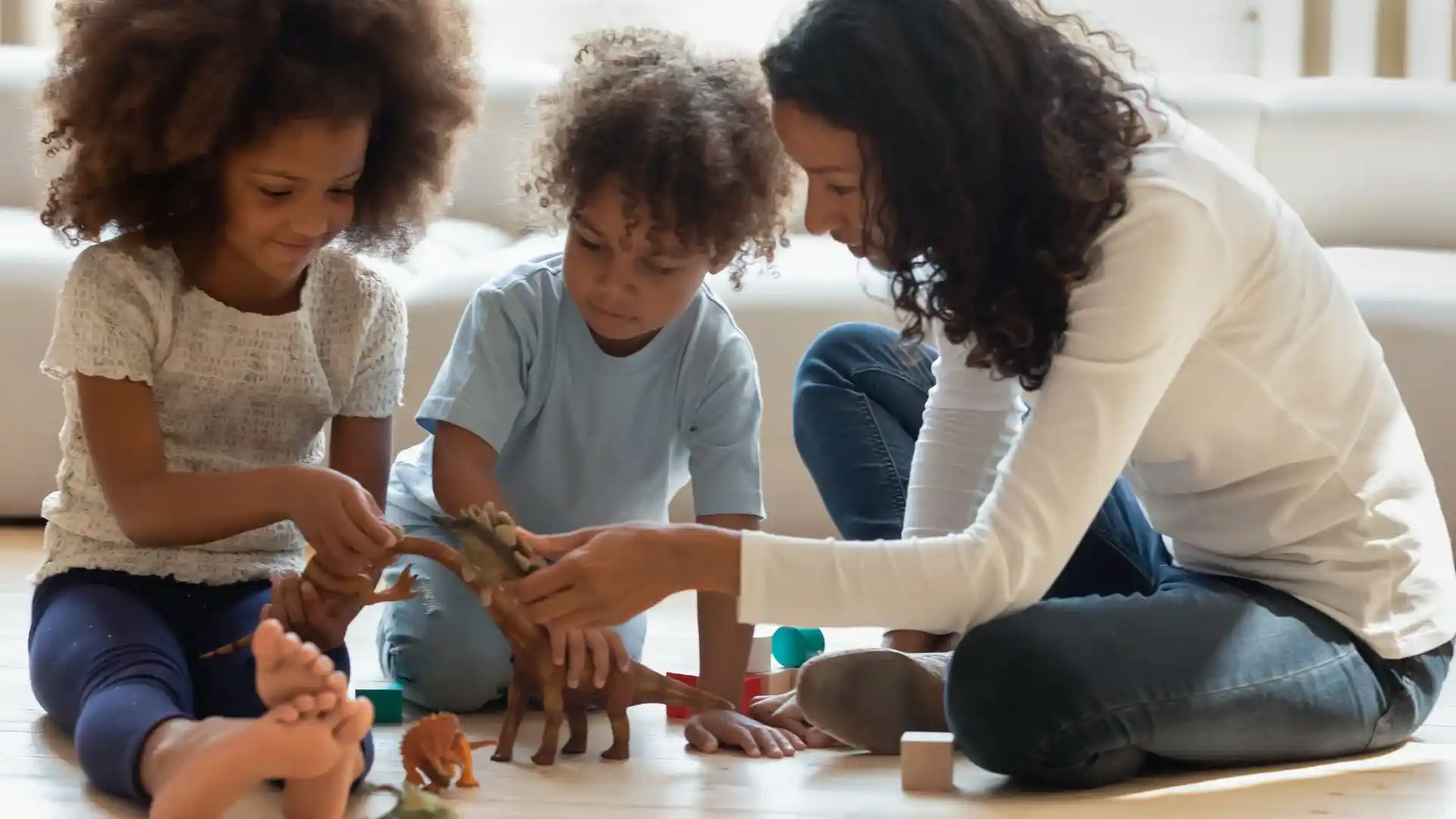 Image of Nanny with child in playroom 