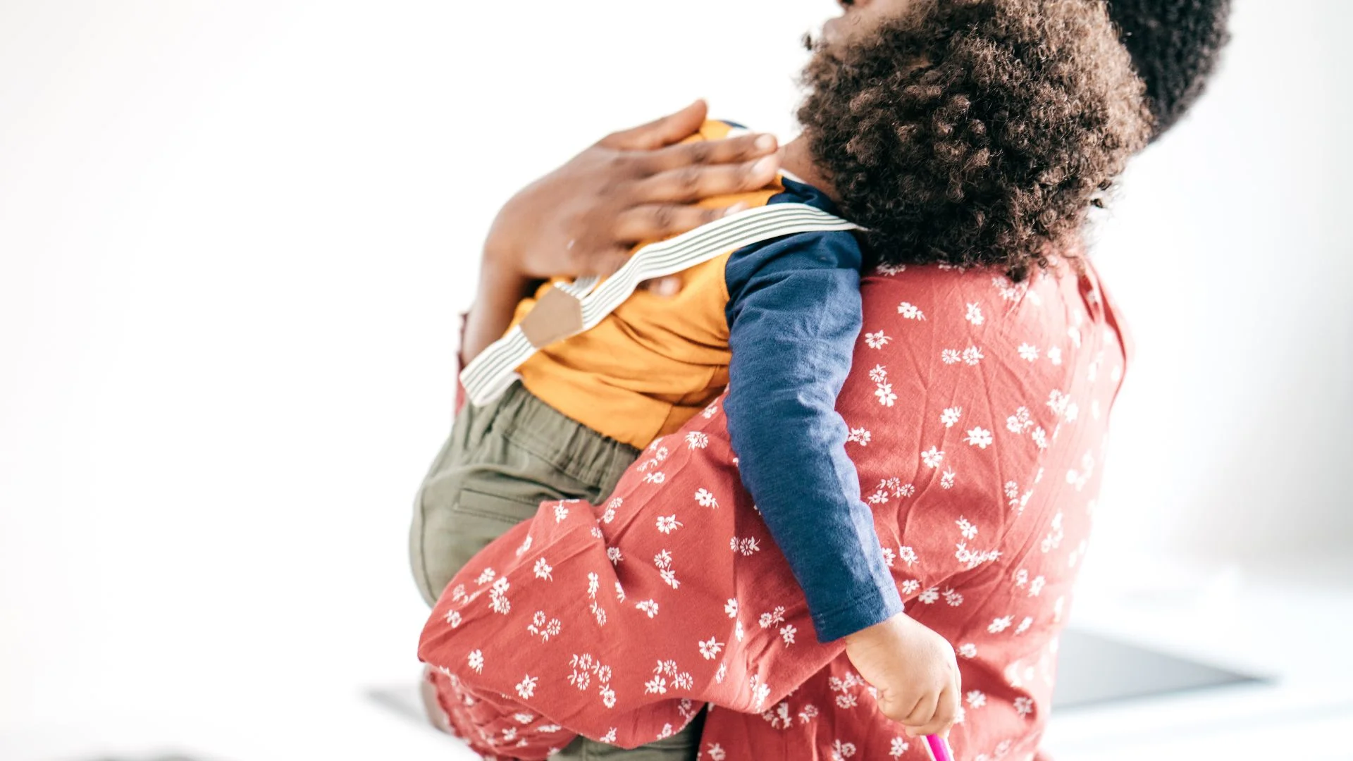 Image of Nanny with child in playroom 