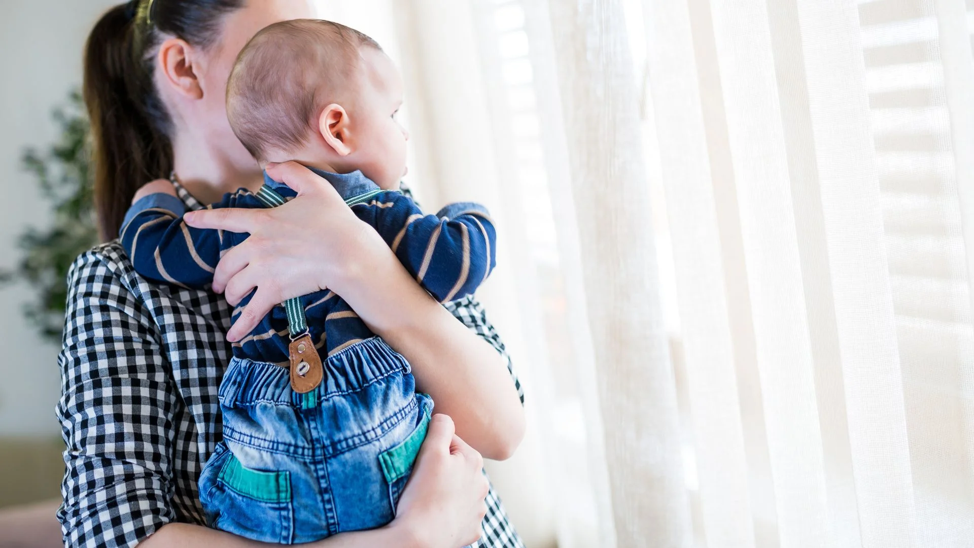 Image of Nanny with child in playroom 